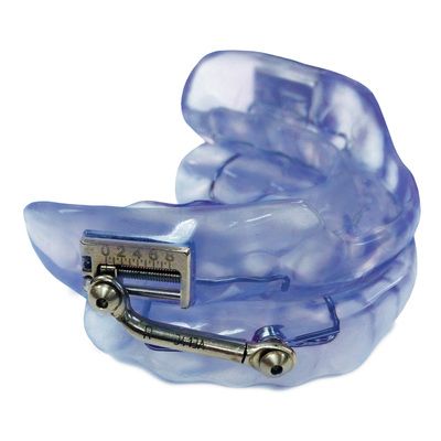 Close up of oral appliance used in general dentistry sleep apnea treatment