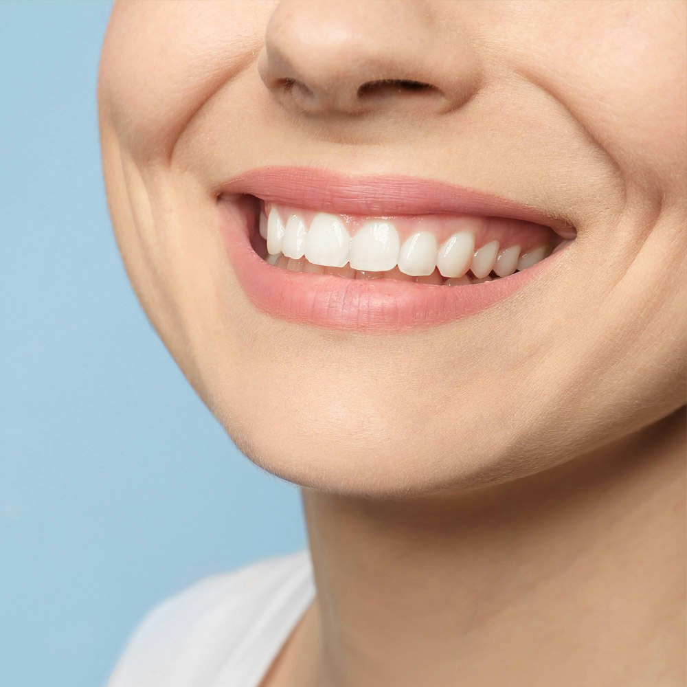 Close-up of smiling mouth after cosmetic dentistry procedure